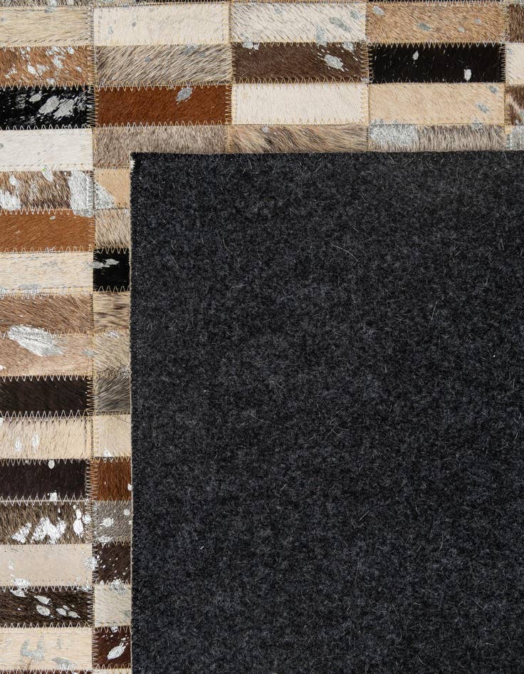 Detail image of 5' x 7' 11 Cowhide - Patchwork Rug