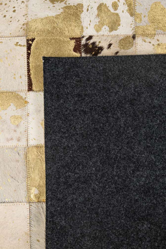 4' 11 x 7' 11 Cowhide - Patchwork Rug