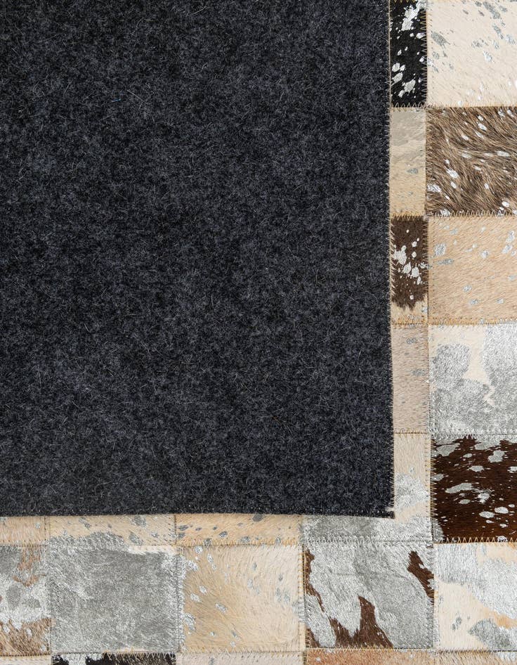 Detail image of 5' 1 x 8' 1 Cowhide - Patchwork Rug