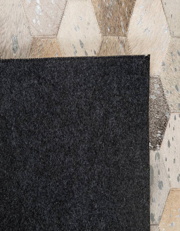 Detail image of 5' 1 x 8' Cowhide - Patchwork Rug