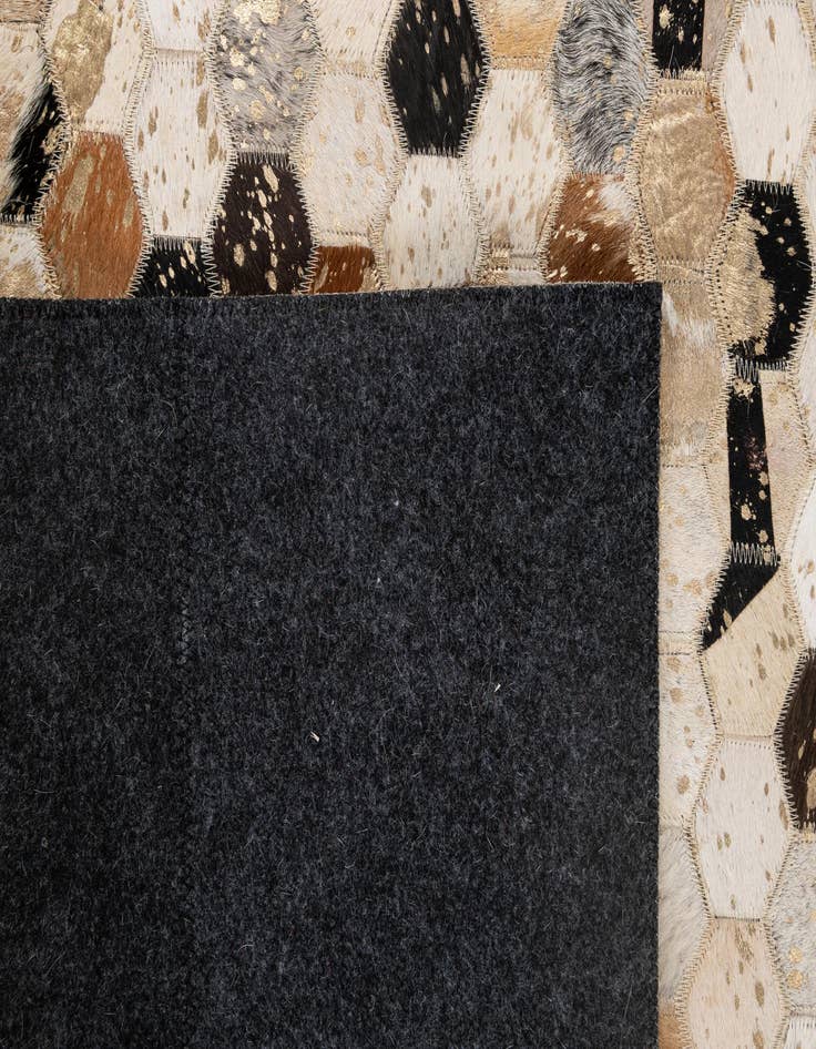 Detail image of 5' 1 x 8' Cowhide - Patchwork Rug