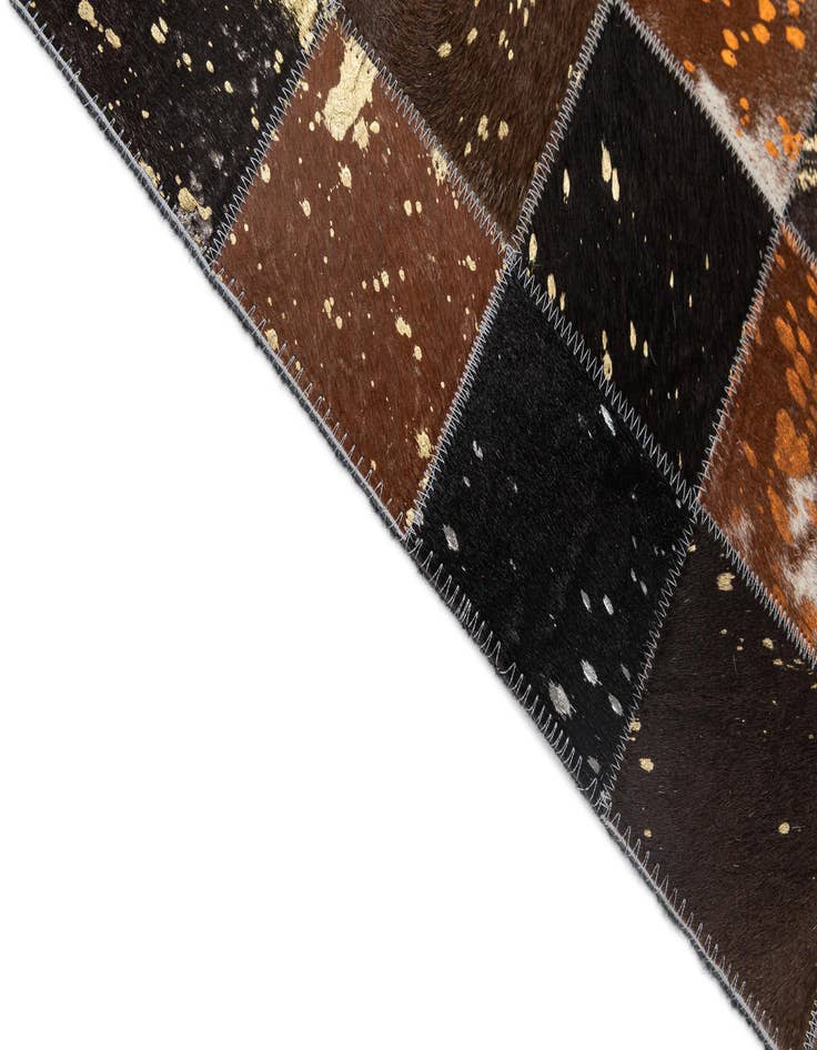 Detail image of 4' 11 x 7' 10 Cowhide - Patchwork Rug