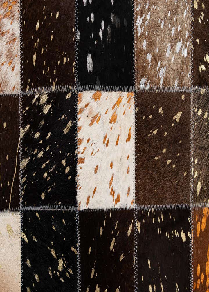 4' 11 x 7' 10 Cowhide - Patchwork Rug