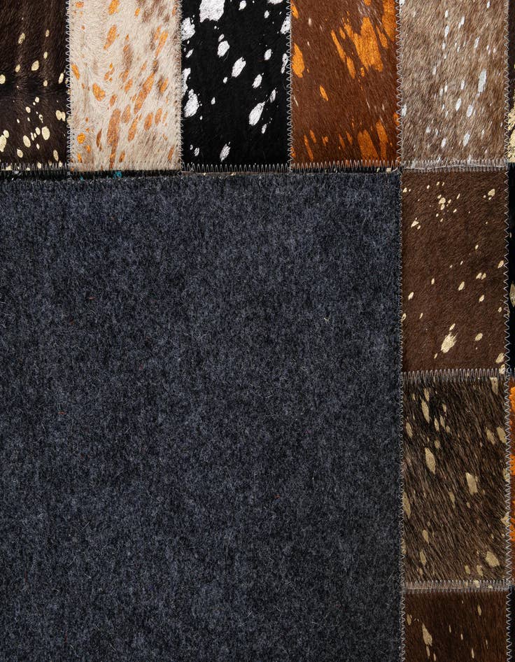 Detail image of 4' 11 x 7' 10 Cowhide - Patchwork Rug