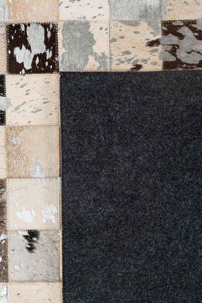 5' 1 x 7' 11 Cowhide - Patchwork Rug