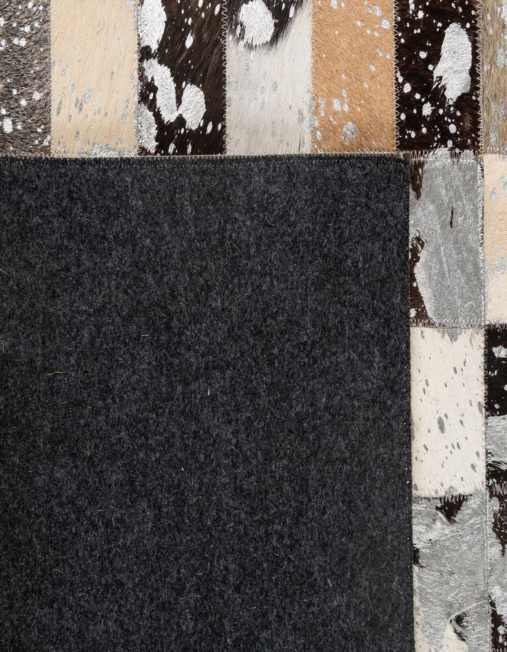 Detail image of 5' 1 x 8' Cowhide - Patchwork Rug