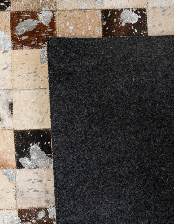 Detail image of 5' 1 x 7' 11 Cowhide - Patchwork Rug