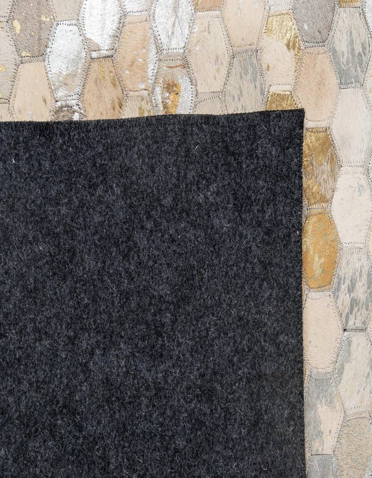 Detail image of 5' 1 x 8' Cowhide - Patchwork Rug