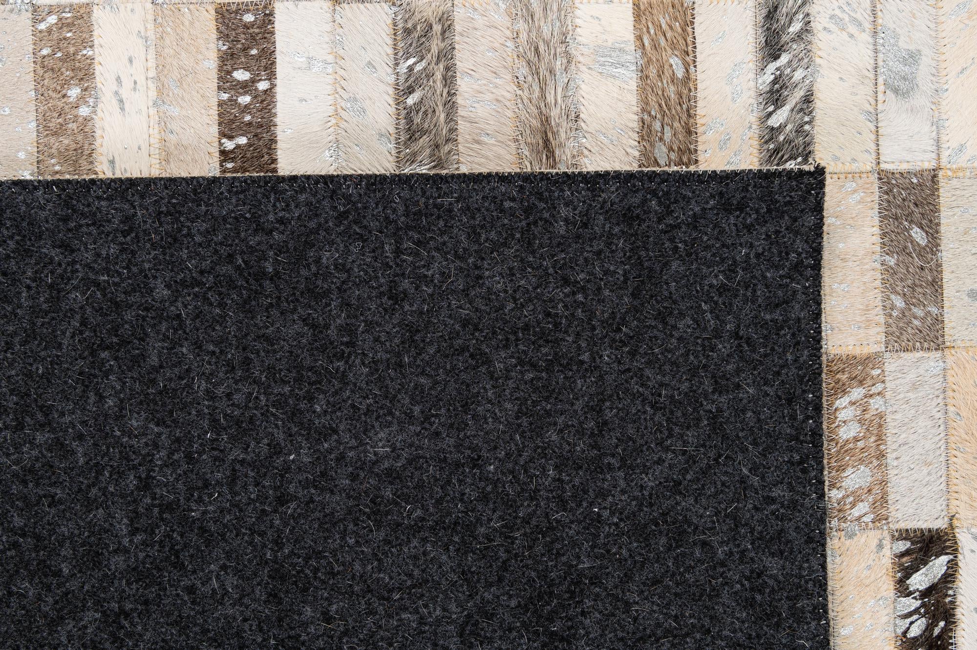5' 1 x 7' 11 Cowhide - Patchwork Rug