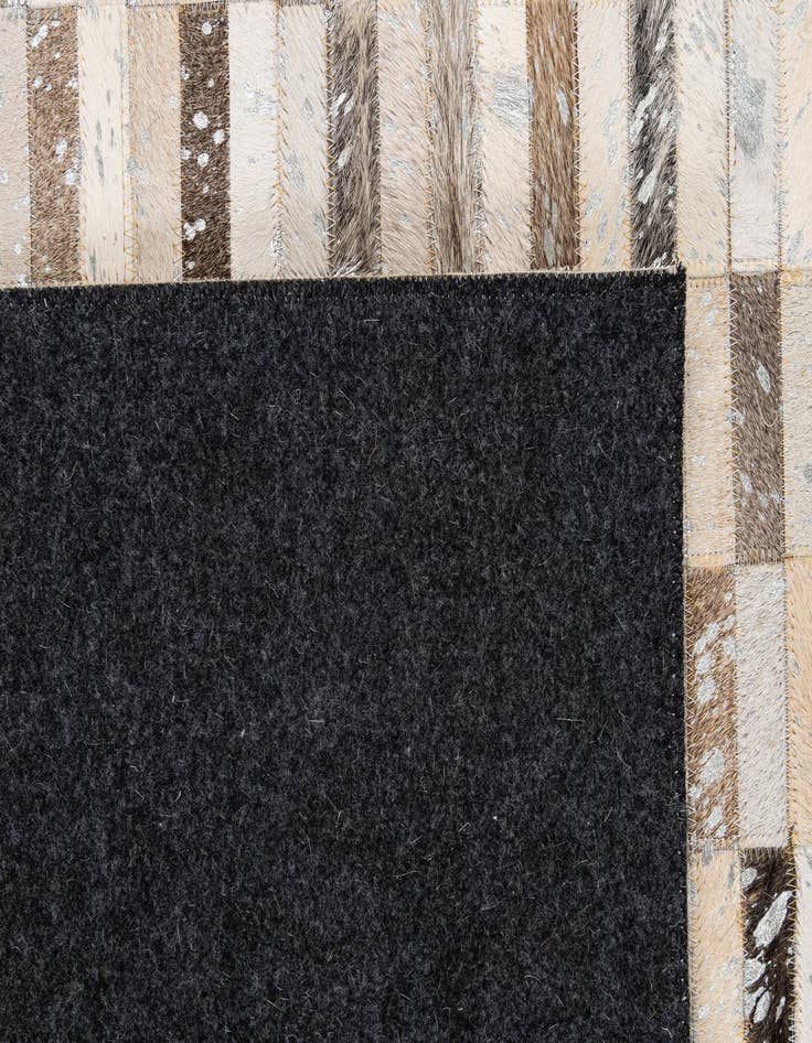 Detail image of 5' 1 x 7' 11 Cowhide - Patchwork Rug