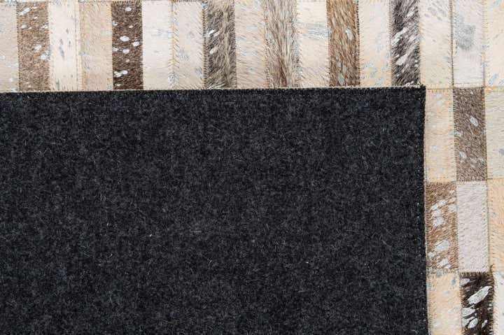 5' 1 x 7' 11 Cowhide - Patchwork Rug