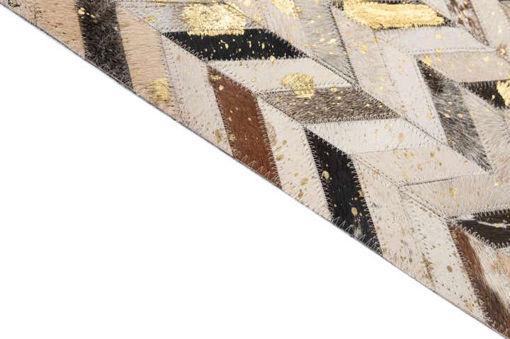 5' 2 x 7' 11 Cowhide - Patchwork Rug