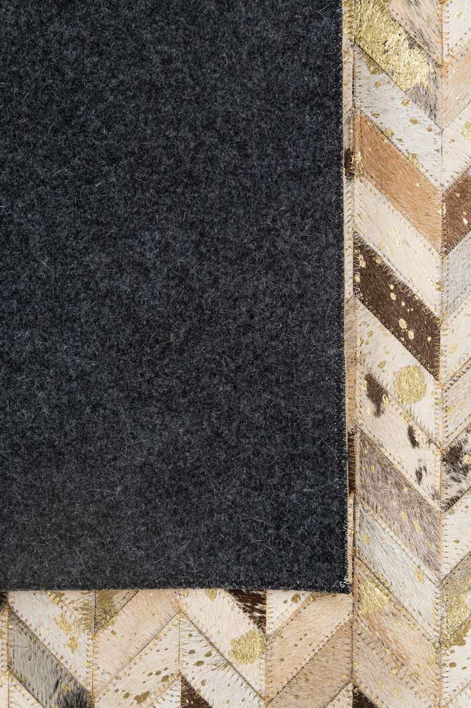 5' 2 x 7' 11 Cowhide - Patchwork Rug