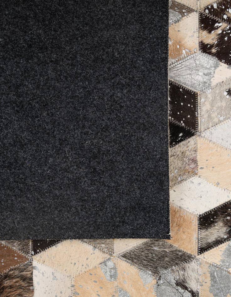Detail image of 5' 1 x 7' 10 Cowhide - Patchwork Rug