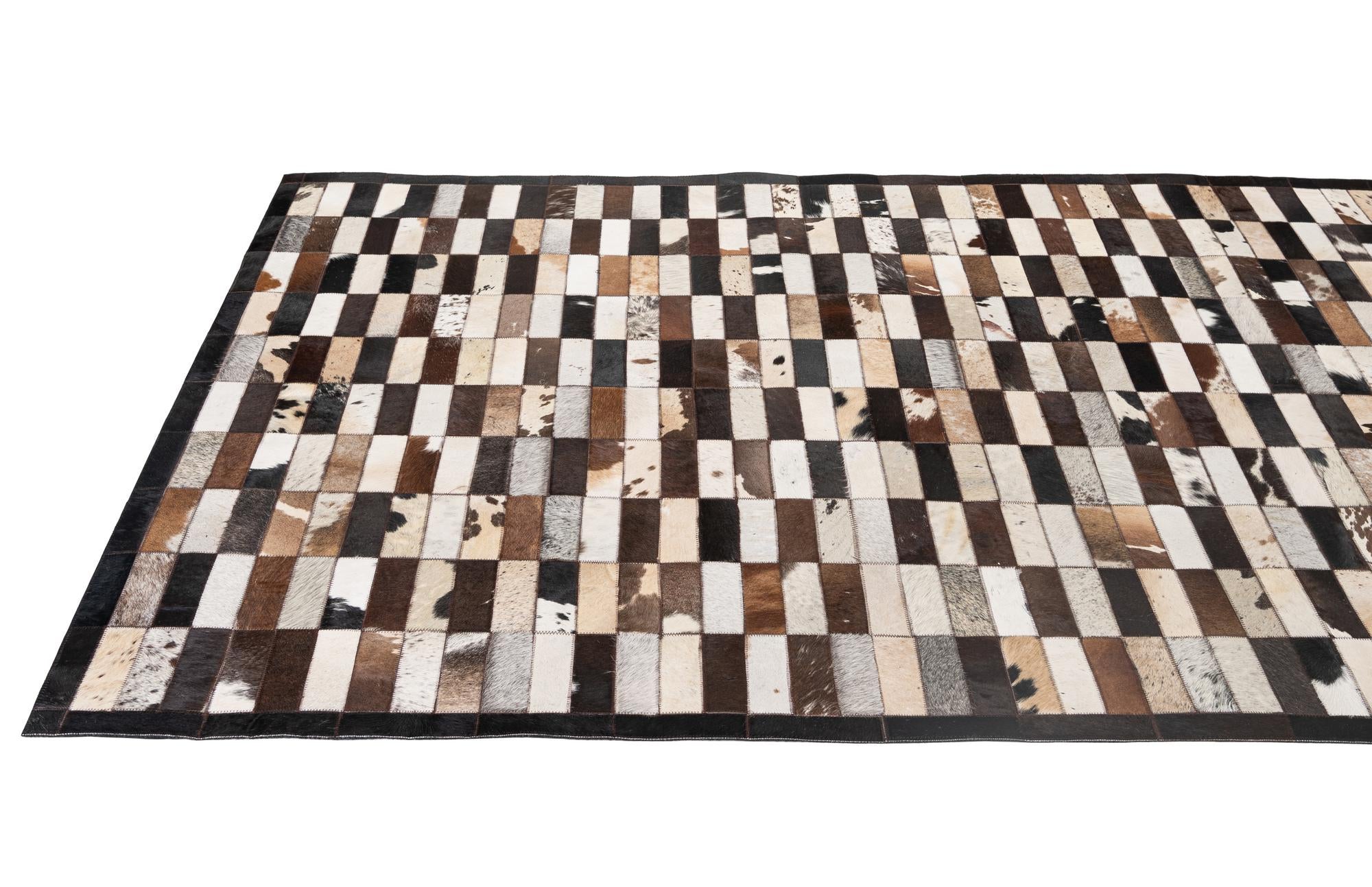 5' 3 x 8' 1 Cowhide - Patchwork Rug