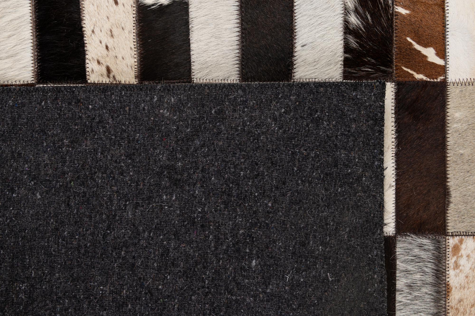 5' 3 x 8' 1 Cowhide - Patchwork Rug