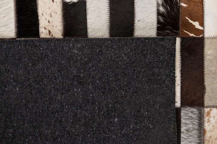 5' 3 x 8' 1 Cowhide - Patchwork Rug