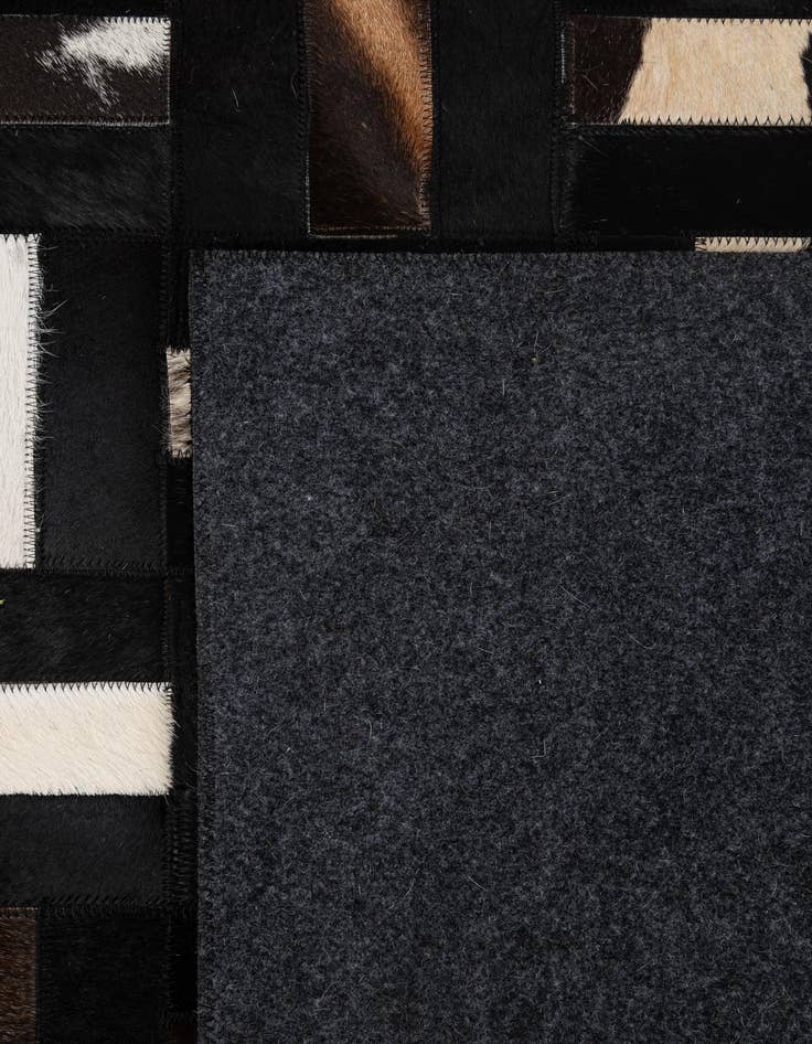 Detail image of 5' 4 x 8' 2 Cowhide - Patchwork Rug