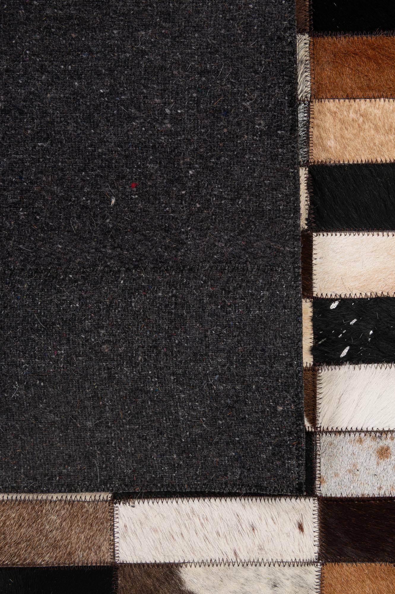 5' 3 x 8' 2 Cowhide - Patchwork Rug