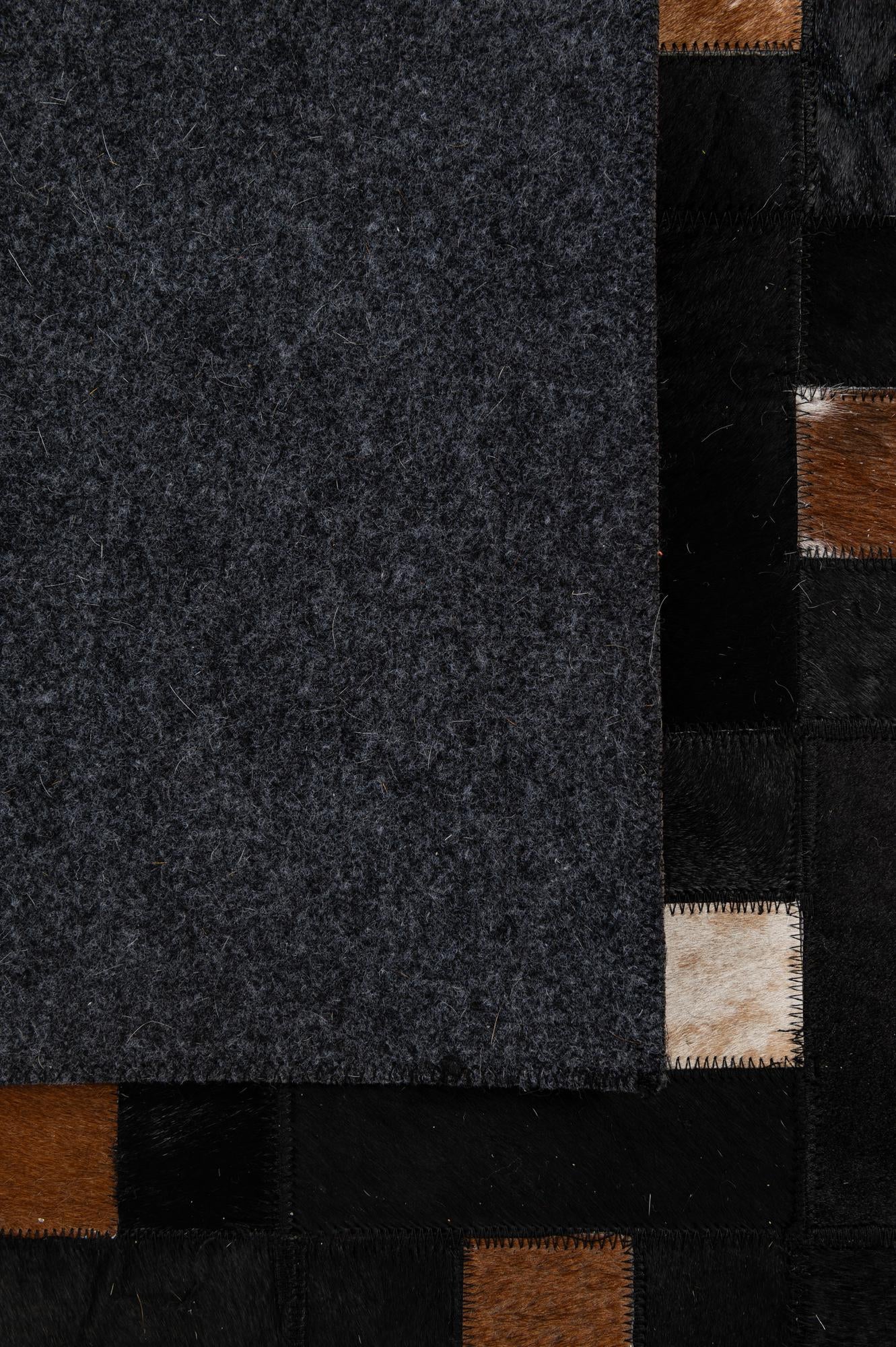5' 3 x 8' 1 Cowhide - Patchwork Rug