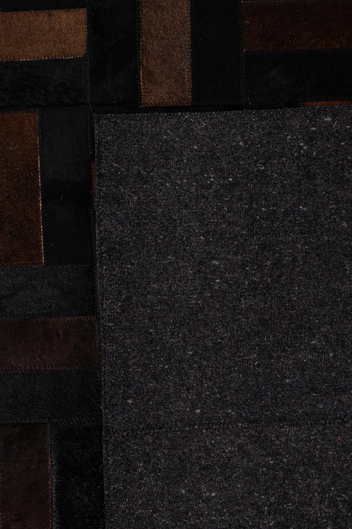 5' 3 x 8' 1 Cowhide - Patchwork Rug