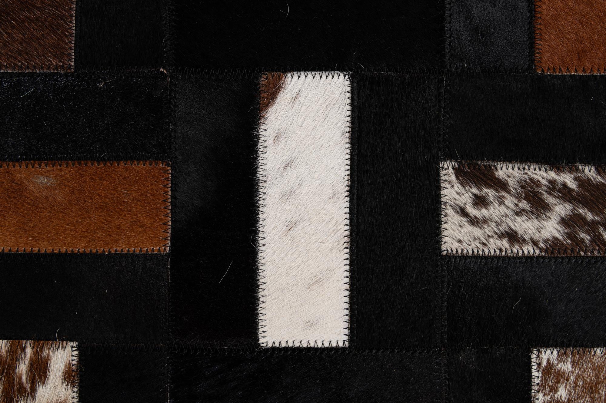 5' 3 x 8' 1 Cowhide - Patchwork Rug
