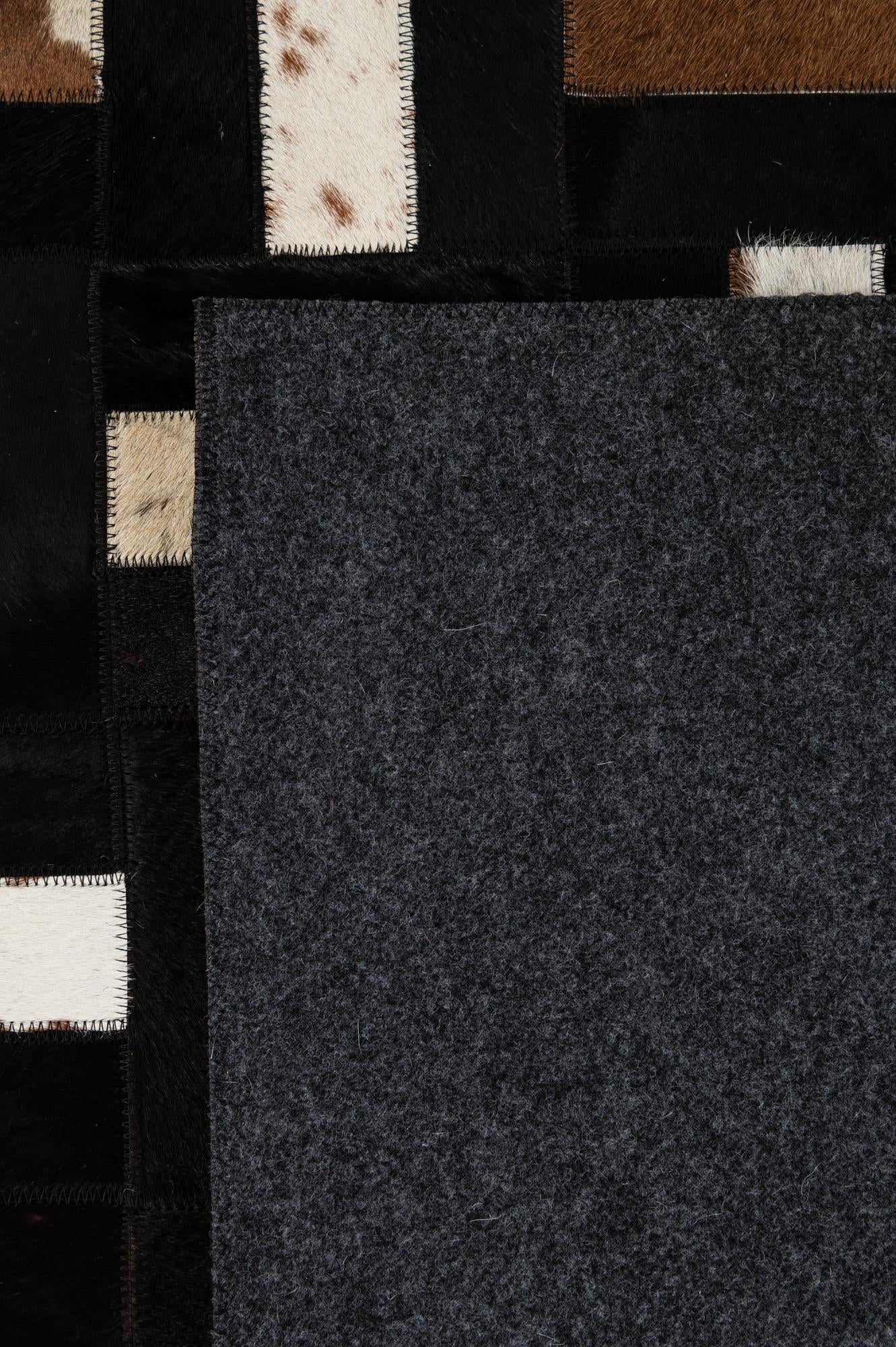 5' 3 x 8' 1 Cowhide - Patchwork Rug