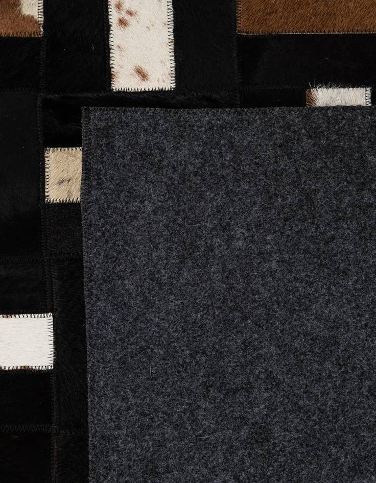 Detail image of 5' 3 x 8' 1 Cowhide - Patchwork Rug