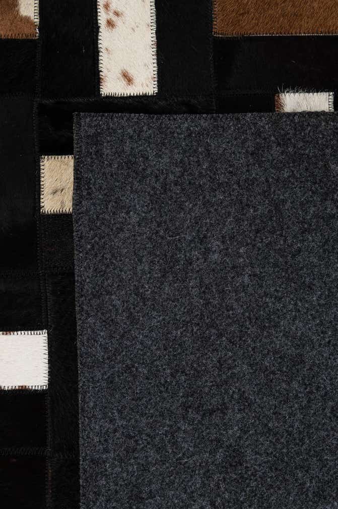 5' 3 x 8' 1 Cowhide - Patchwork Rug