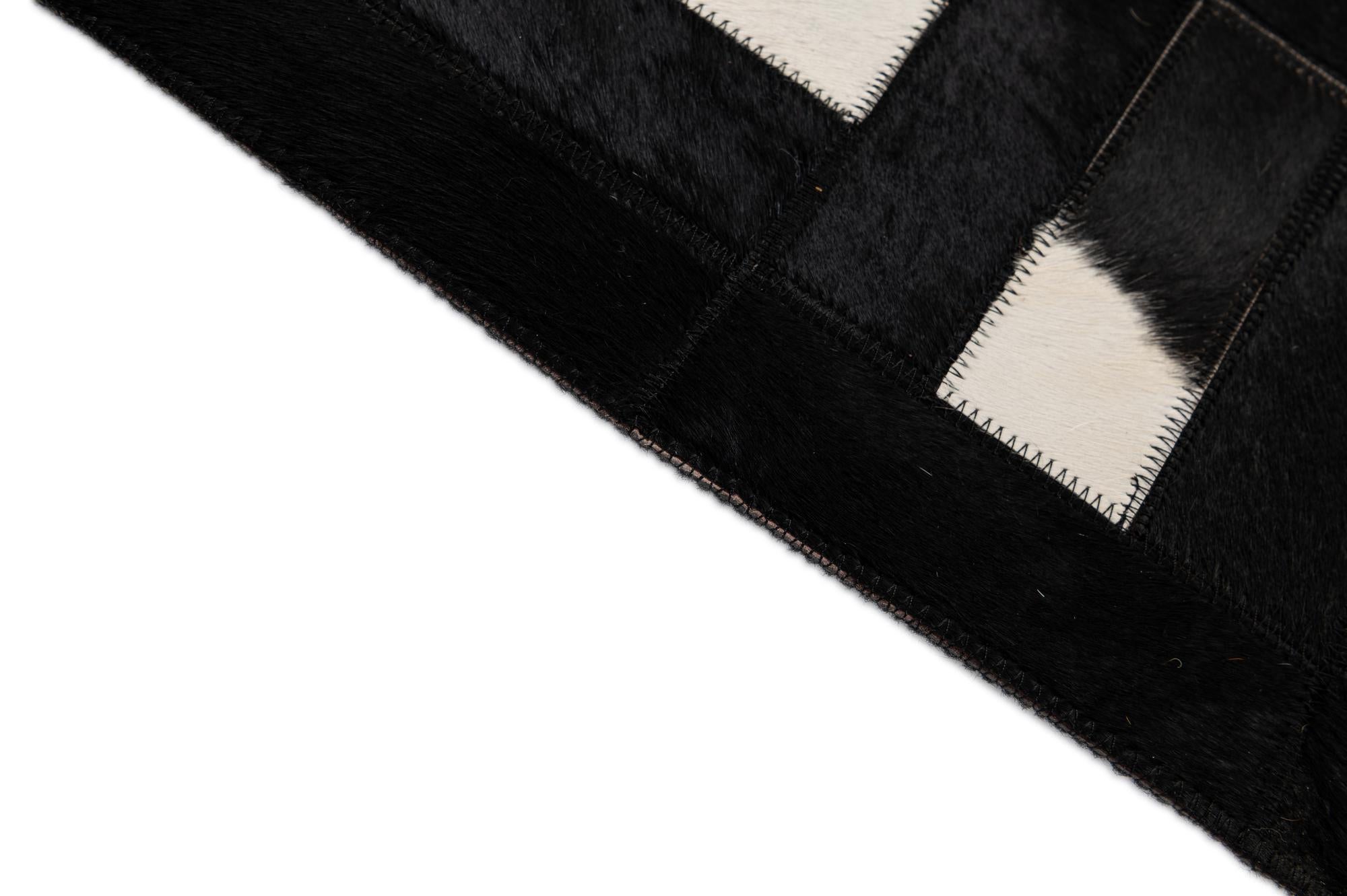 5' 3 x 8' 2 Cowhide - Patchwork Rug