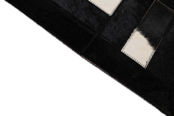 Detail image of 5' 3 x 8' 2 Cowhide - Patchwork Rug