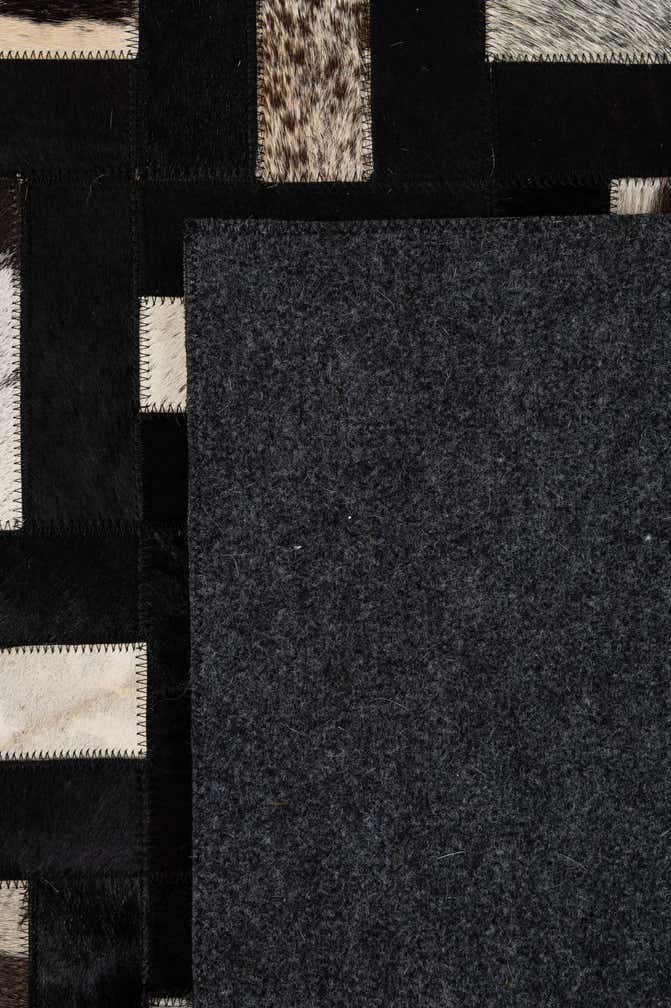 5' 3 x 8' 2 Cowhide - Patchwork Rug