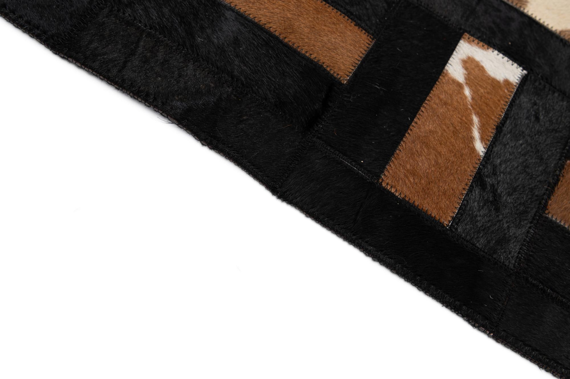 5' 3 x 8' 2 Cowhide - Patchwork Rug
