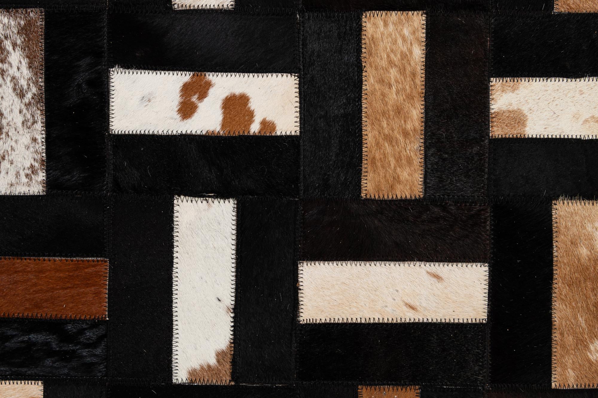 5' 3 x 8' 2 Cowhide - Patchwork Rug