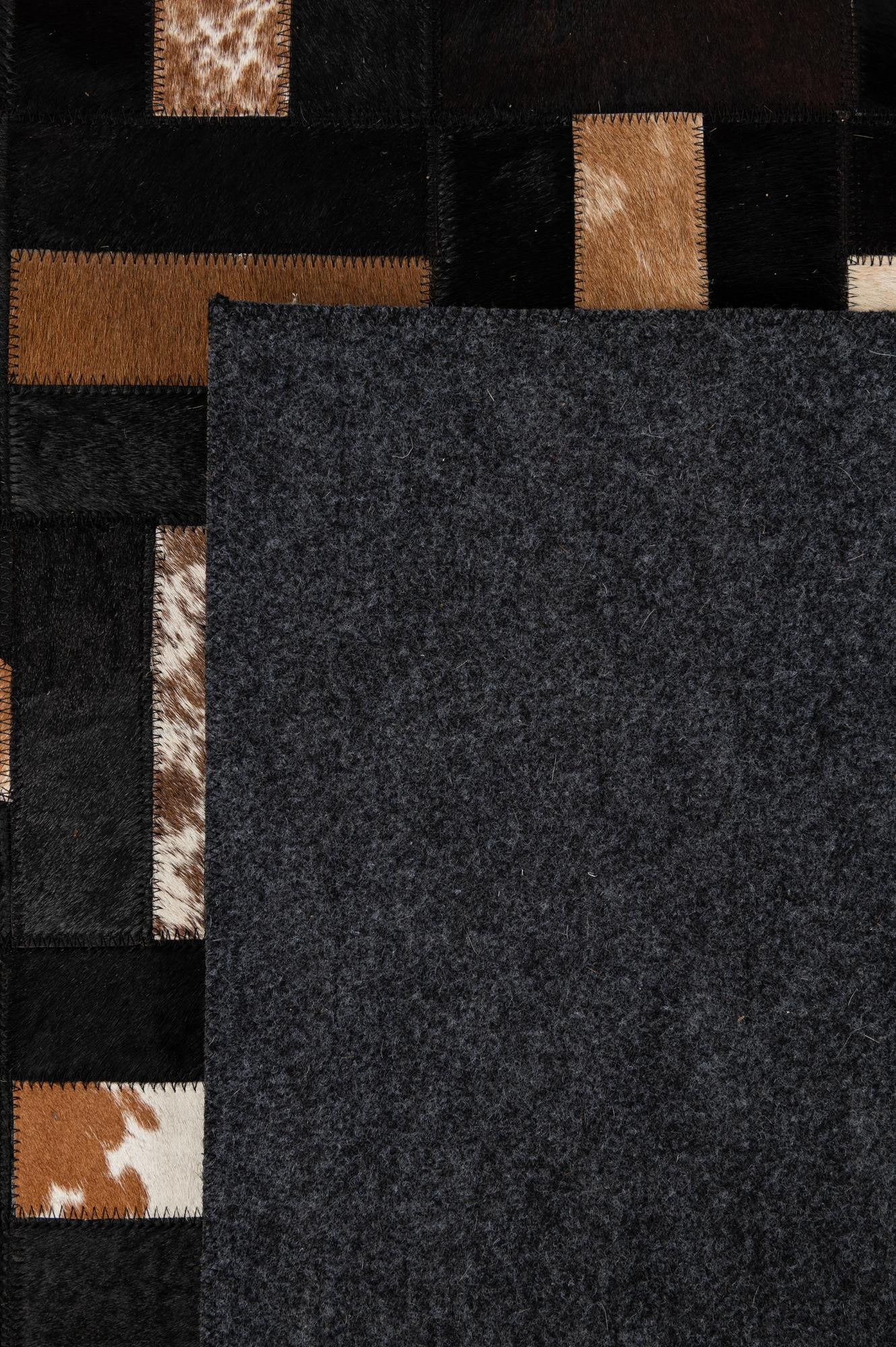 5' 3 x 8' 2 Cowhide - Patchwork Rug