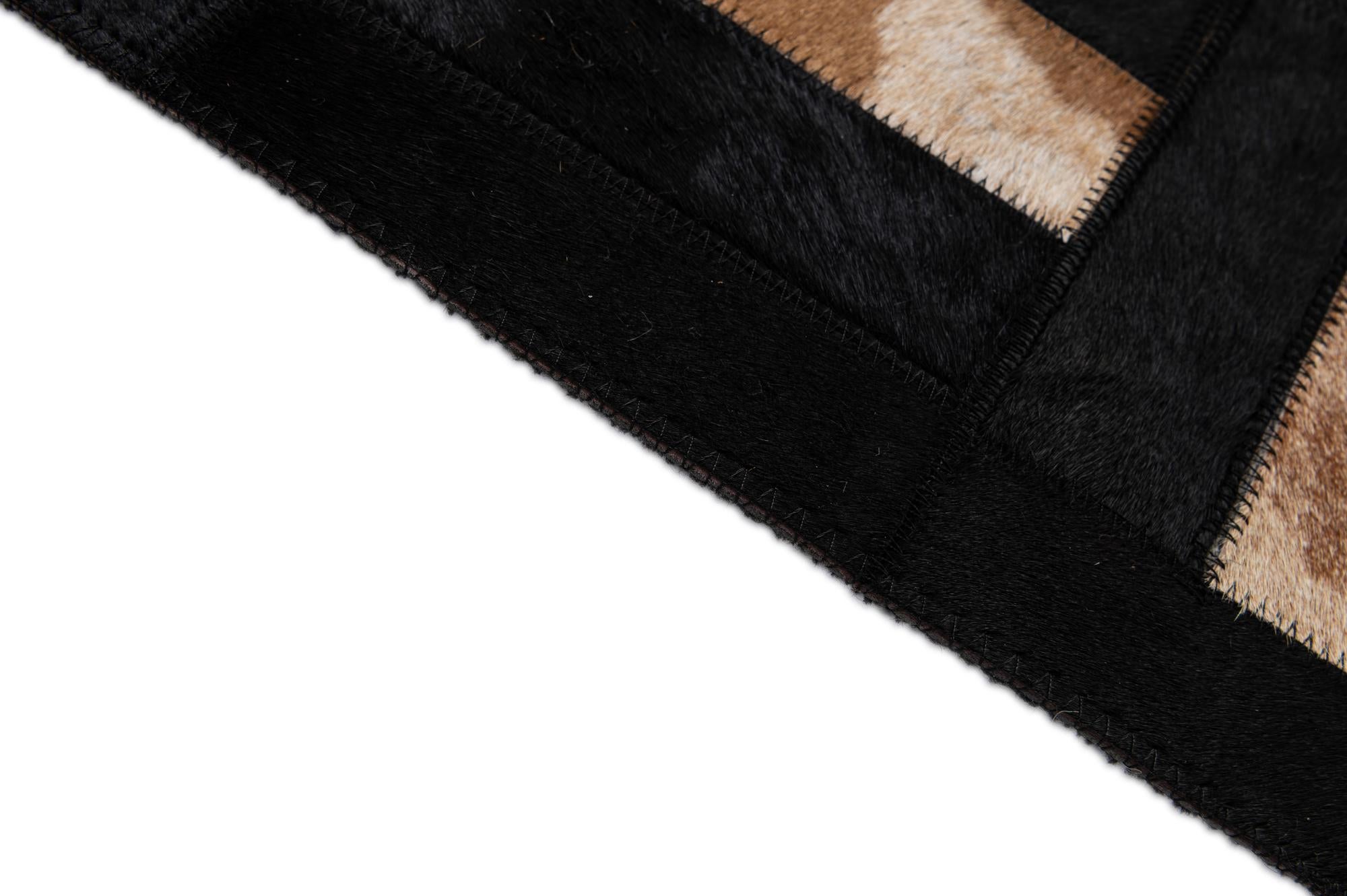 5' 3 x 8' 1 Cowhide - Patchwork Rug