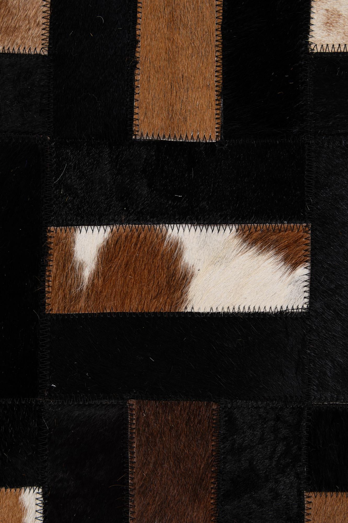 5' 3 x 8' 1 Cowhide - Patchwork Rug