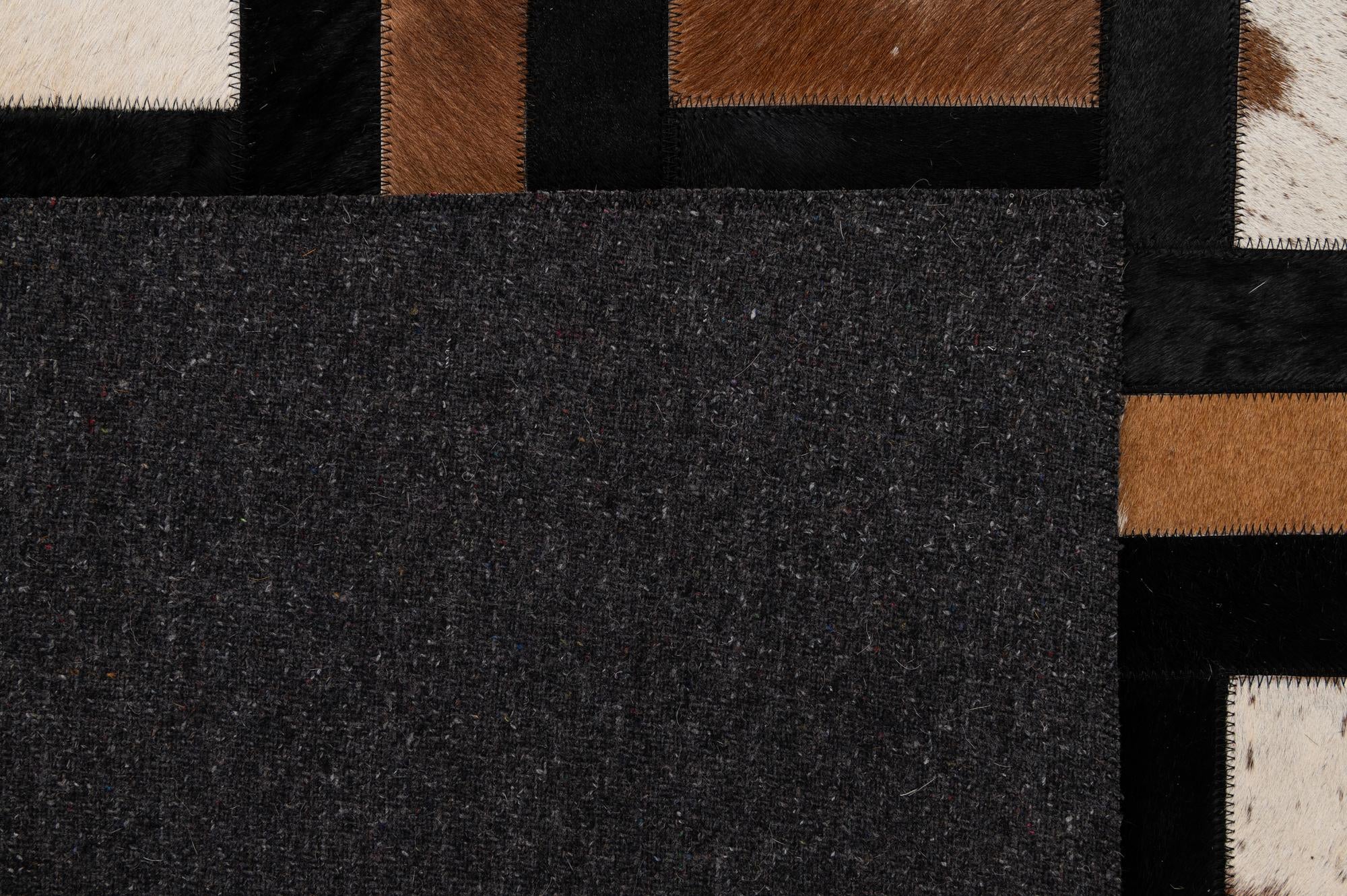 5' 3 x 8' 1 Cowhide - Patchwork Rug