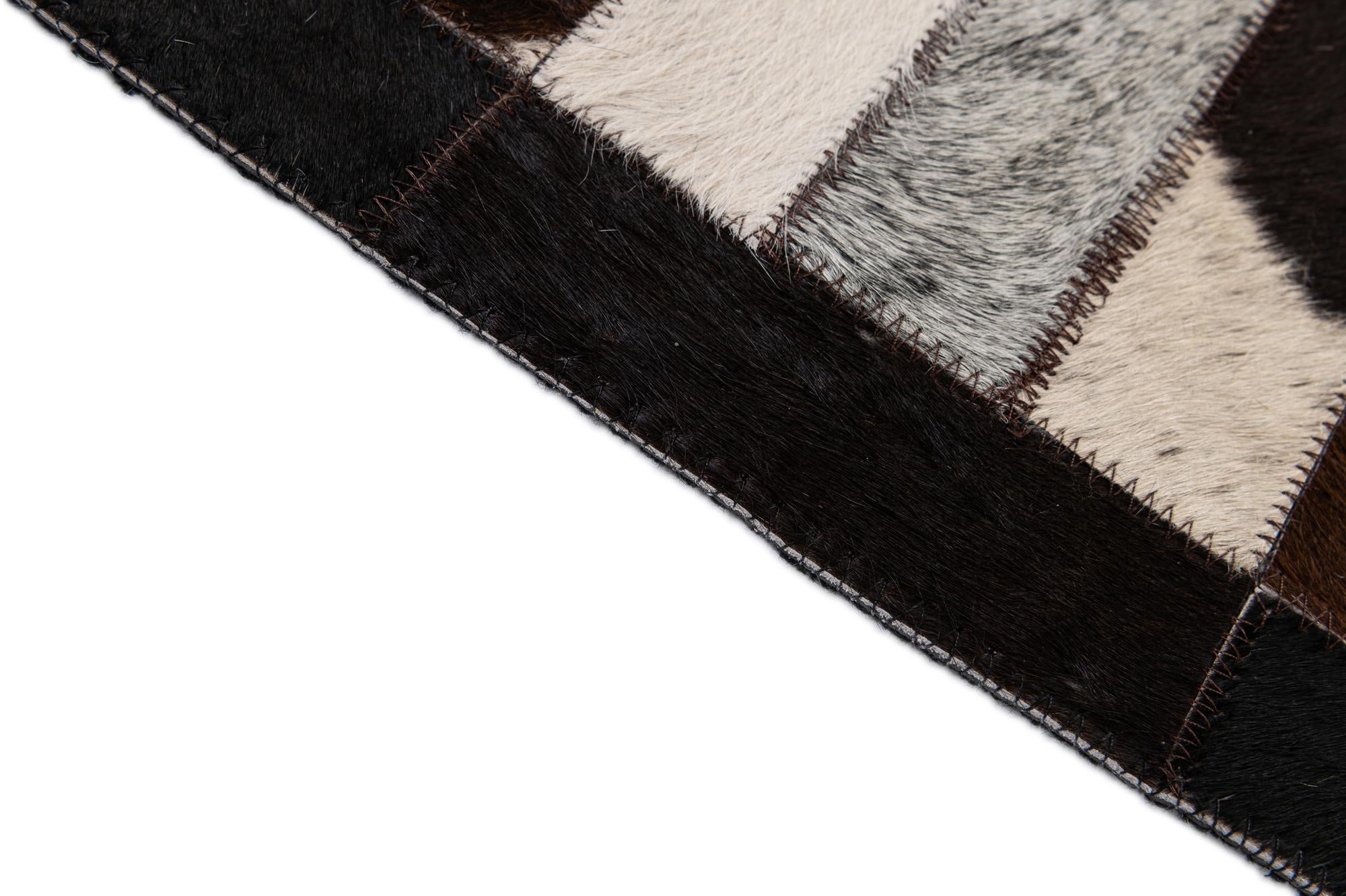 5' 3 x 8' Cowhide - Patchwork Rug