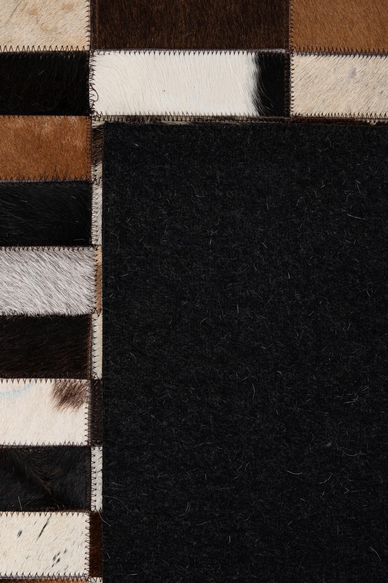 5' 3 x 8' Cowhide - Patchwork Rug