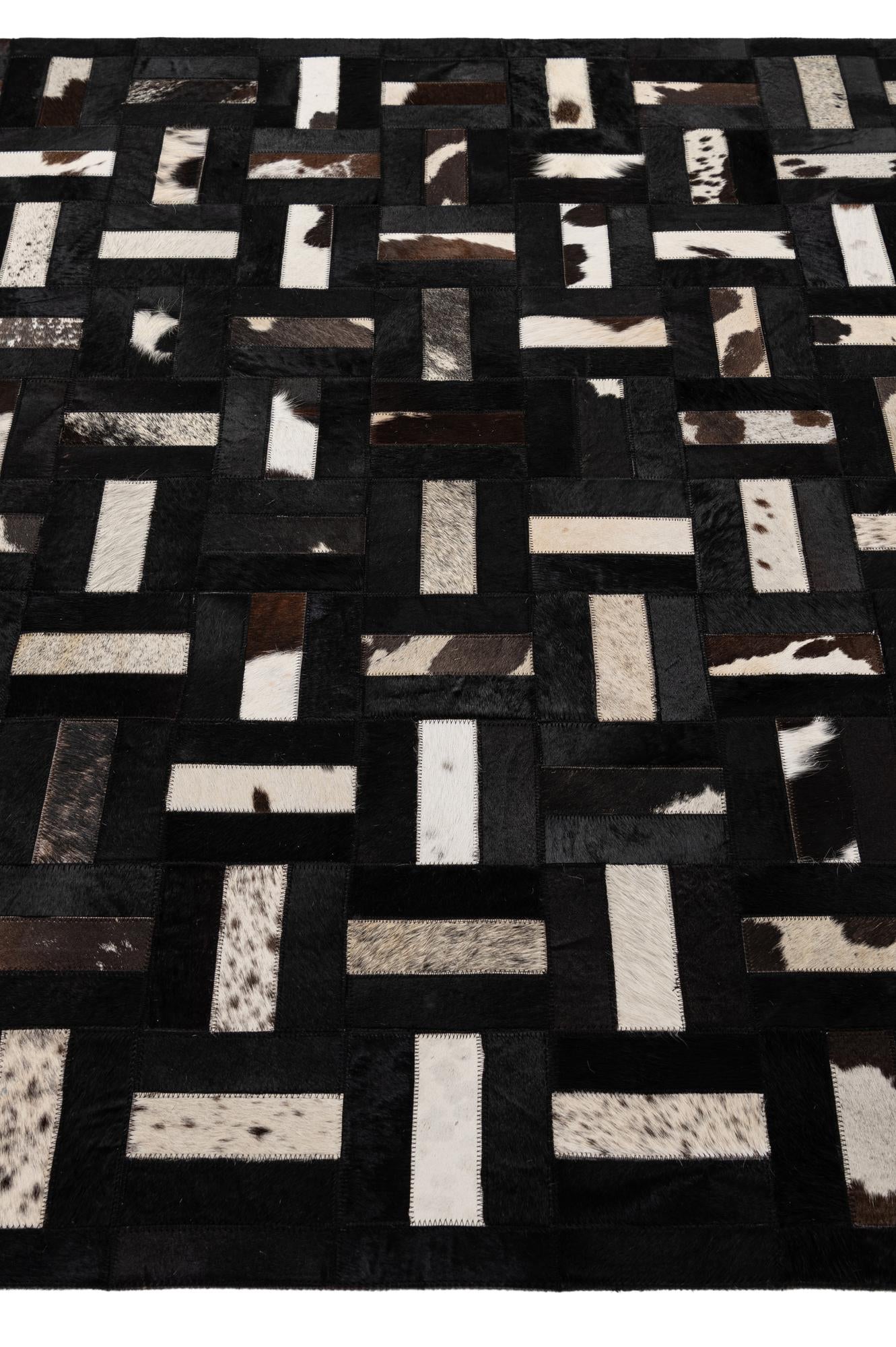 5' 4 x 8' 2 Cowhide - Patchwork Rug