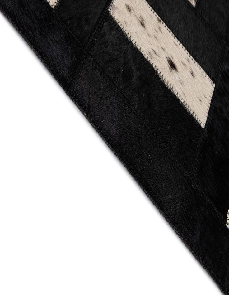 Detail image of 5' 4 x 8' 2 Cowhide - Patchwork Rug