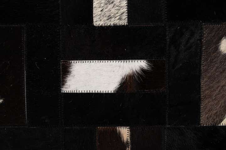 5' 4 x 8' 2 Cowhide - Patchwork Rug
