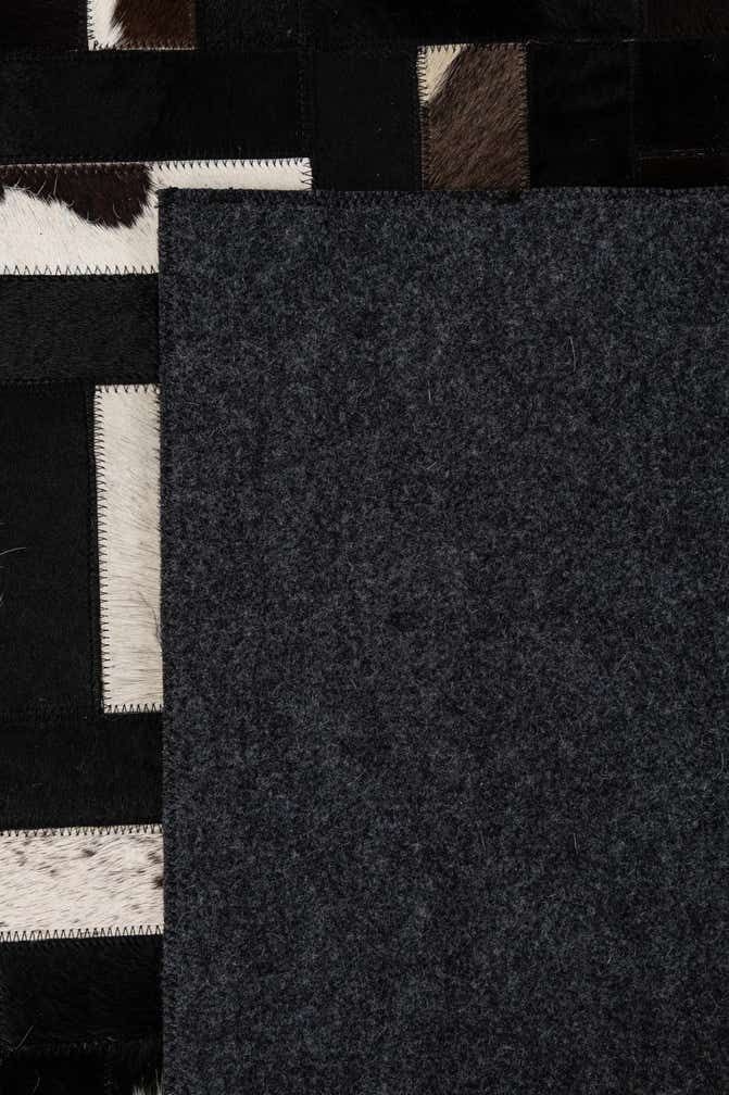 5' 4 x 8' 2 Cowhide - Patchwork Rug