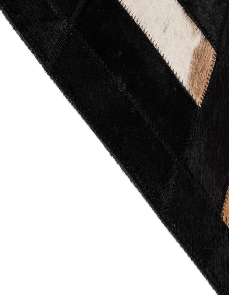 Detail image of 5' 3 x 8' 2 Cowhide - Patchwork Rug