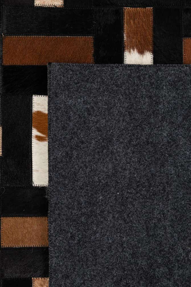 5' 3 x 8' 2 Cowhide - Patchwork Rug