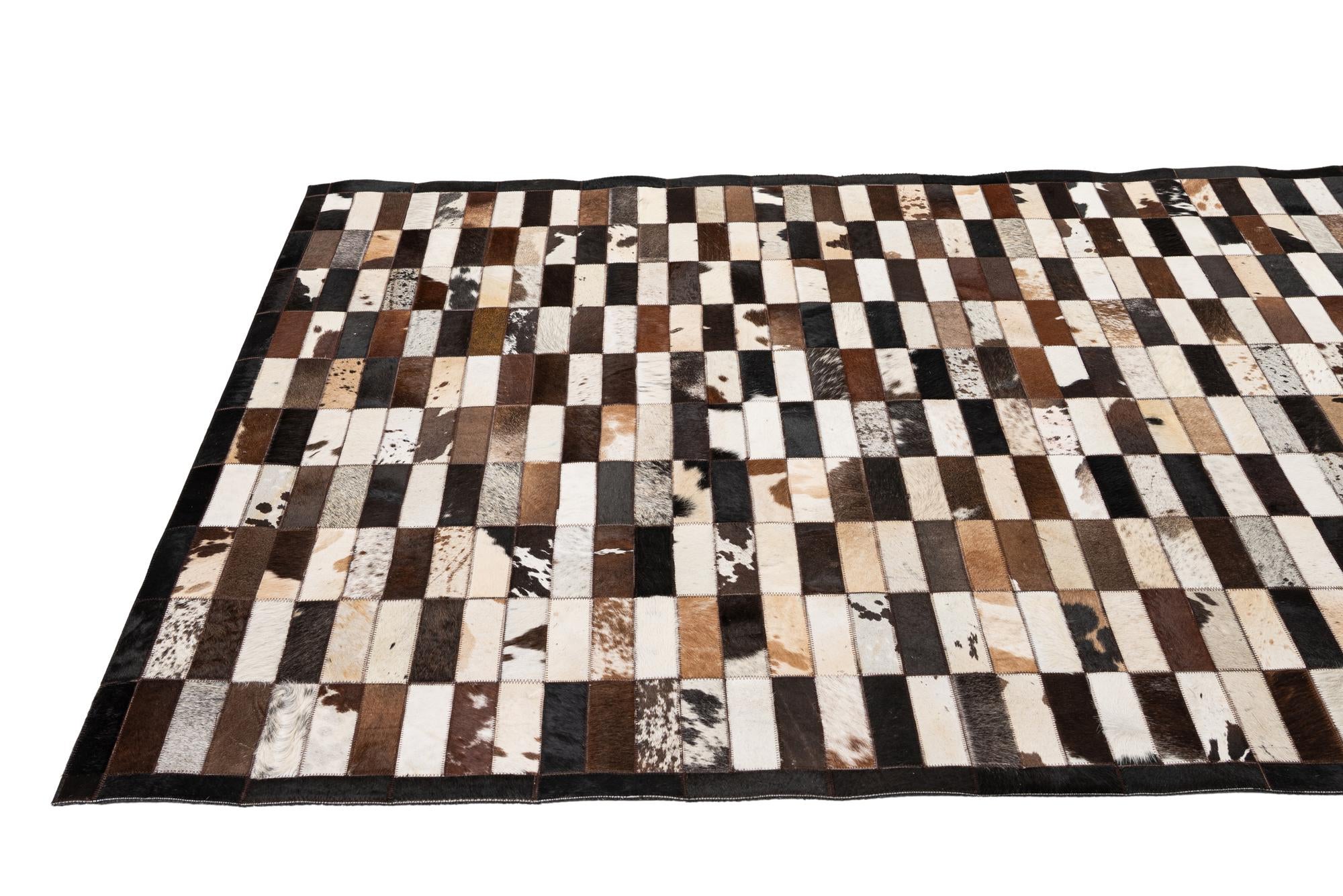5' 3 x 8' 1 Cowhide - Patchwork Rug