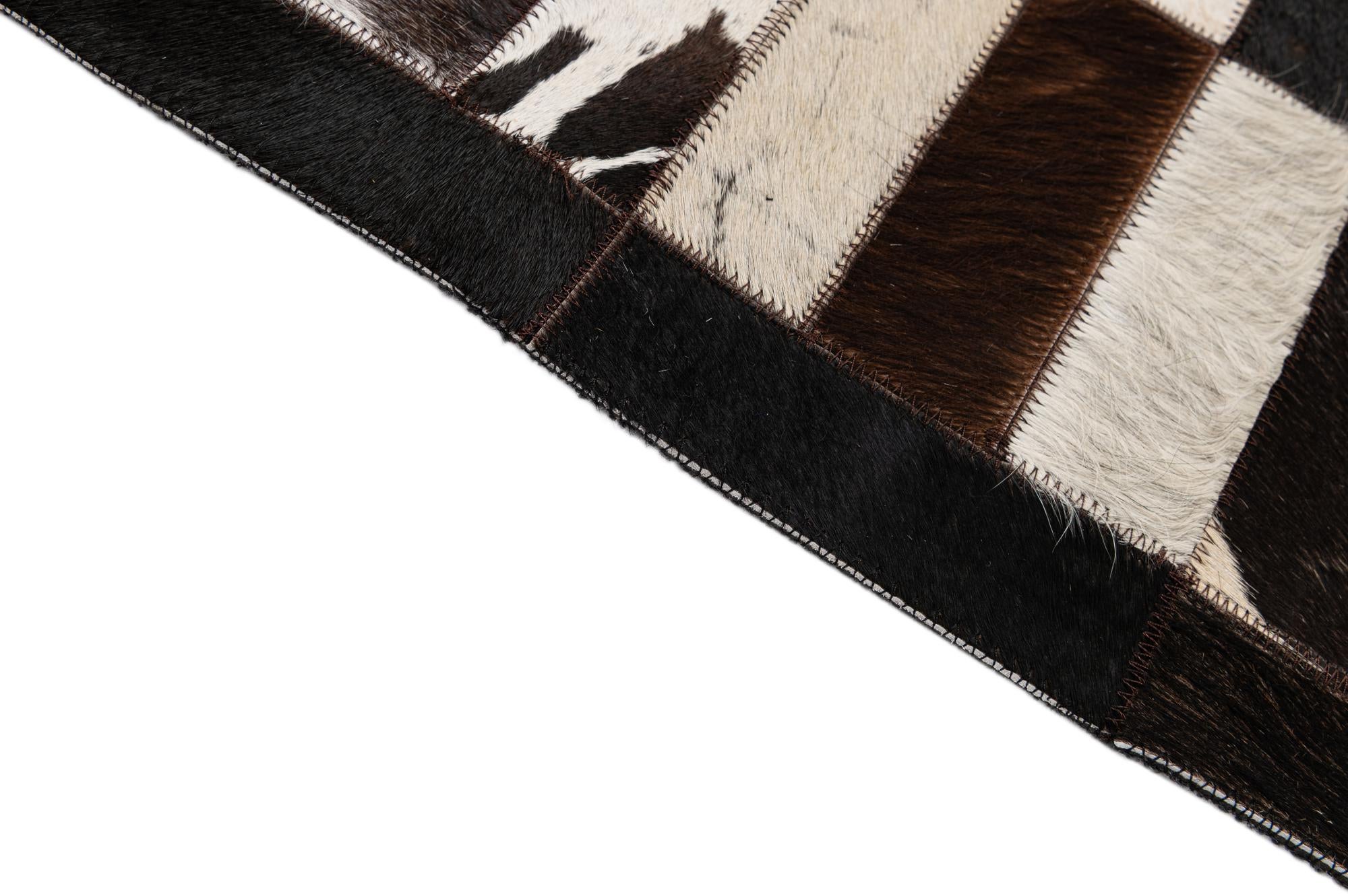 5' 3 x 8' 1 Cowhide - Patchwork Rug