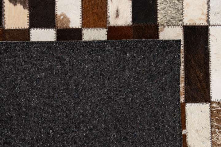 5' 3 x 8' 1 Cowhide - Patchwork Rug