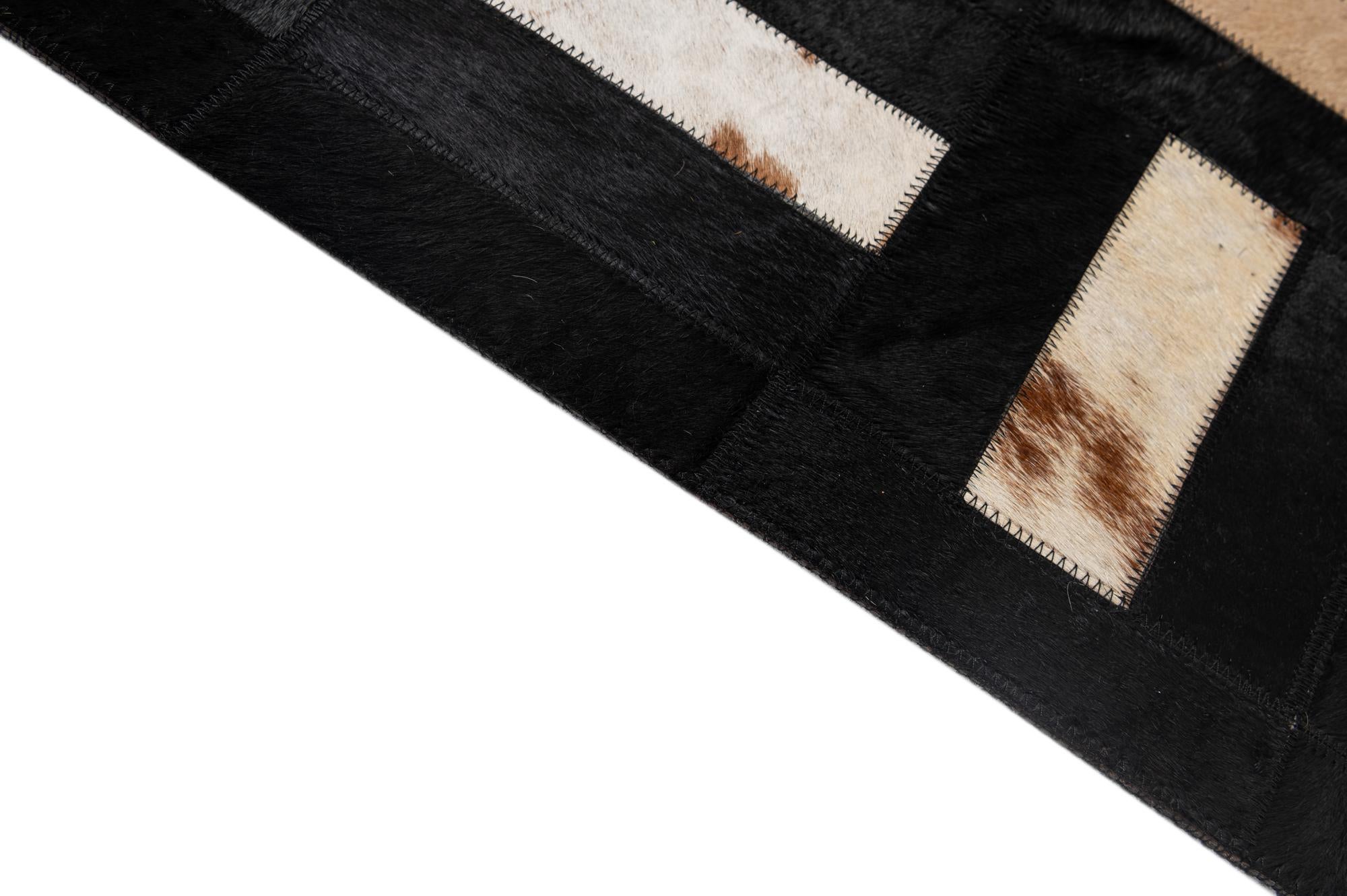 5' 3 x 8' 1 Cowhide - Patchwork Rug